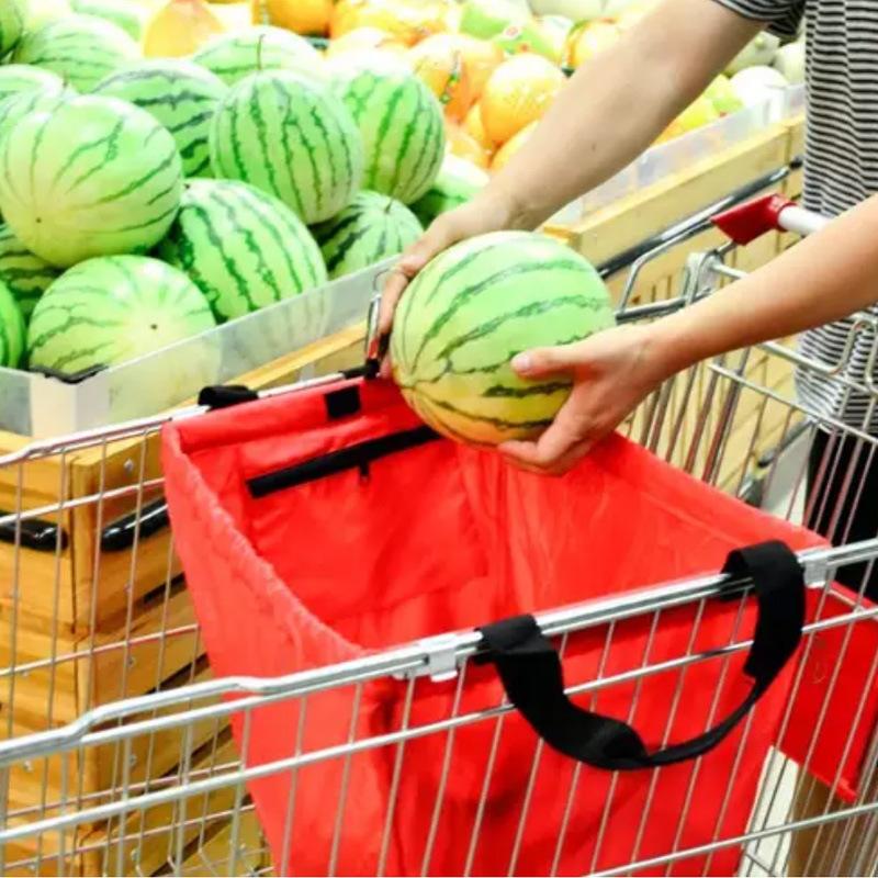 Portable shopping bag on the supermarket trolley
